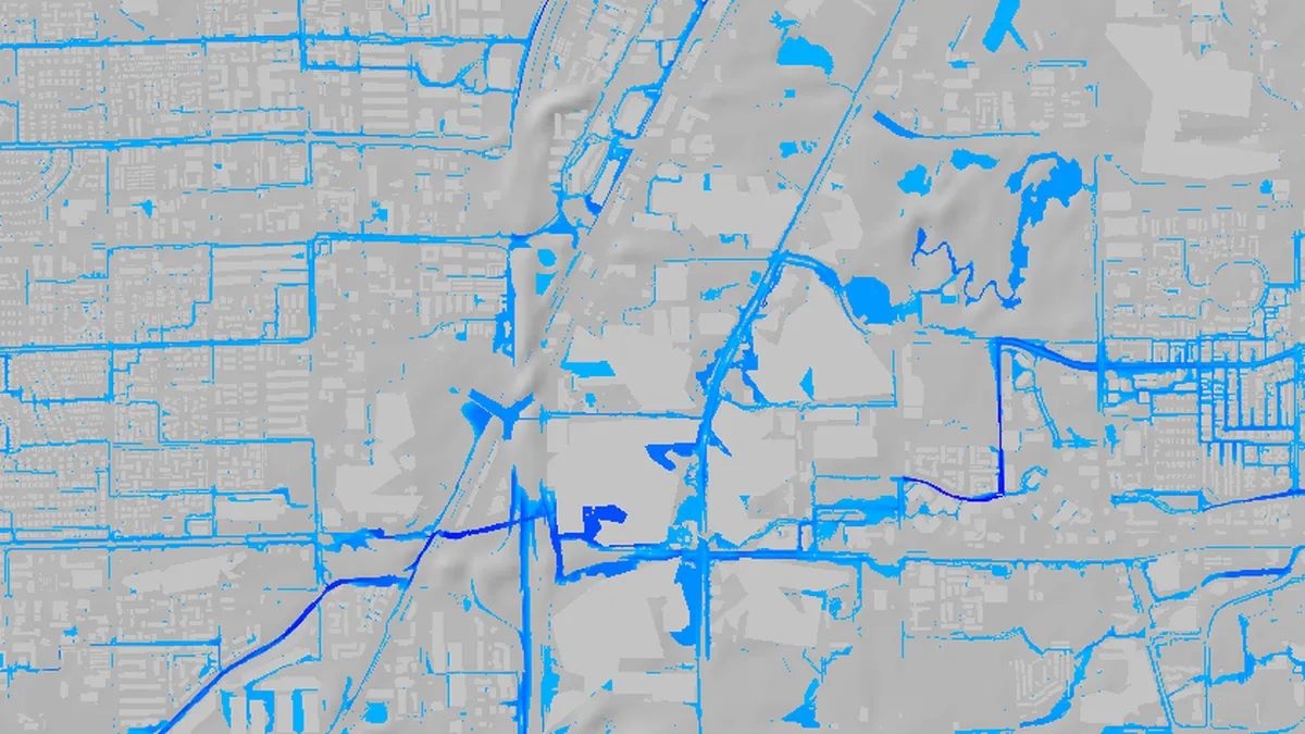 Map of modelled peak flood depth in blue along the streets and washes around the Las Vegas Strip